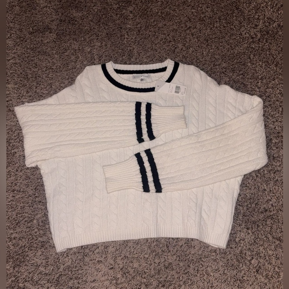 Classic White Cable Knit Sweater with Black Trim